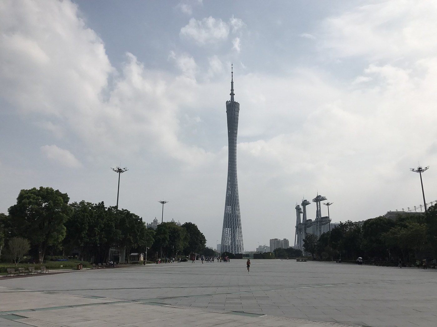 The Canton Tower lit at night above the Pearl River in Guangzhou