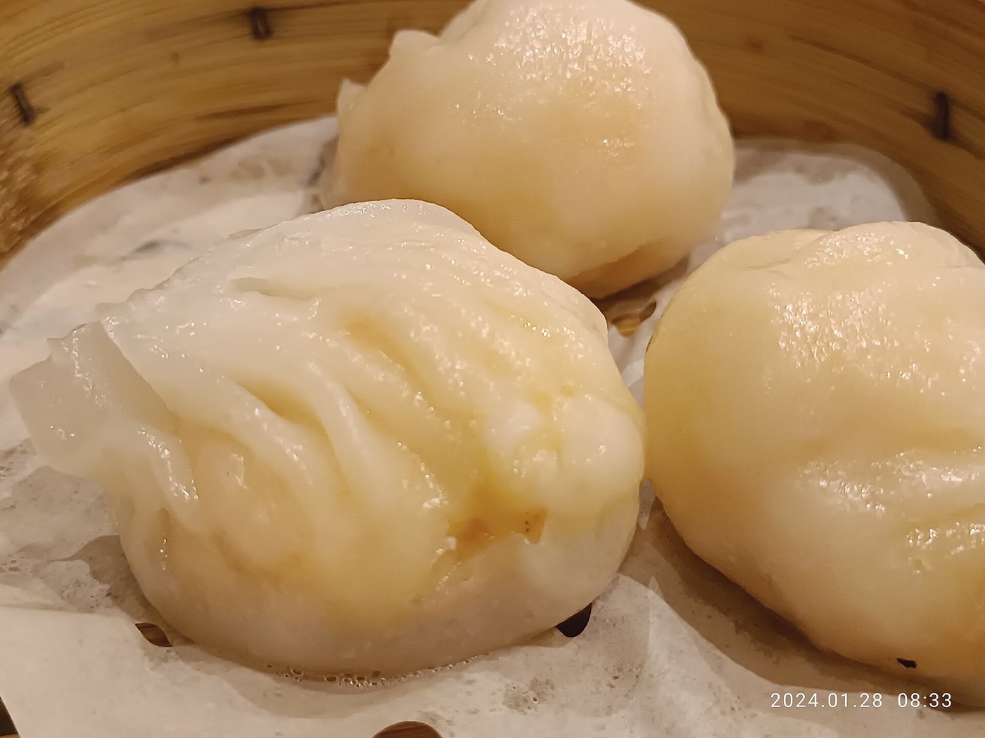 Har gow shrimp dumplings in a bamboo steamer